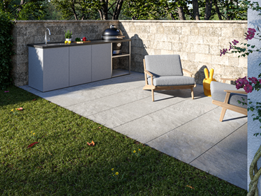 Terras met Classic Grey steeneffectplaat en buitenkeuken