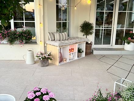 Travertin look platen Siena terrasbank avondzon