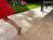 Terrasplaten Travertin Medium Select met lopend kind