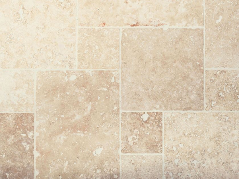 Travertin tegels Ivory Cream in een gemengd patroon van bovenaf